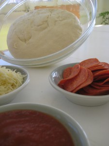 homemade pizza crust dough with toppings